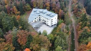 an aerial view of a building in the forest at Forest View Apartment in Pohorje