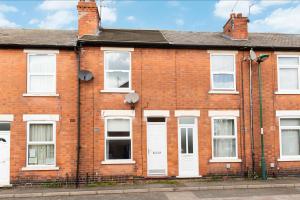 a brick house with white doors and windows at Homely 2-bed Home in Nottingham by Renzo, Free Wi-Fi, Ideal for Contractors in Nottingham