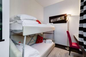 Postel nebo postele na pokoji v ubytování Best Western Cinemusic Hotel