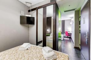 Postel nebo postele na pokoji v ubytování Best Western Cinemusic Hotel