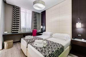 Postel nebo postele na pokoji v ubytování Best Western Cinemusic Hotel + 37 fotografií