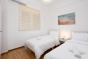 Ένα ή περισσότερα κρεβάτια σε δωμάτιο στο City Chic Apartment with Park View