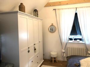 Postel nebo postele na pokoji v ubytování Gîte La Fontaine des Prés