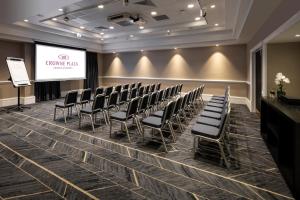 a conference room with chairs and a projection screen at Crowne Plaza Leeds by IHG in Leeds +67 photos