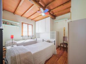 Postel nebo postele na pokoji v ubytování Holiday Home L'Aia by Interhome