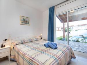 מיטה או מיטות בחדר ב-Holiday Home Montalt I by Interhome