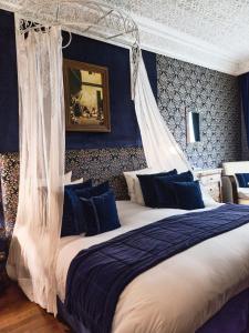 Postel nebo postele na pokoji v ubytování Hôtel particulier Le DOGE - Relais & Châteaux