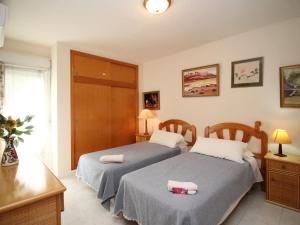 Postel nebo postele na pokoji v ubytování Apartment Celio I by Interhome