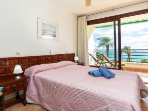 A bed or beds in a room at Apartment Gregal by Interhome