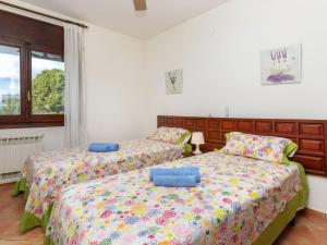 A bed or beds in a room at Apartment Gregal by Interhome