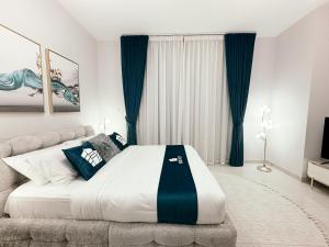 Postel nebo postele na pokoji v ubytování Luxurious Studio in Business Bay Dubai