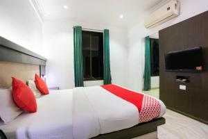 Voodi või voodid majutusasutuse Hotel Prince Residency toas