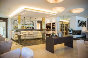 Posezení v ubytování Iris Porsche Hotel & Restaurant
