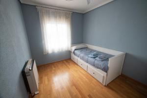 Postel nebo postele na pokoji v ubytování CASA DOVELA