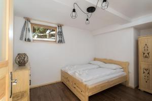 Posteľ alebo postele v izbe v ubytovaní Rent like home - Hidden Hill Szymaszkowa 12