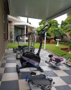 a group of exercise bikes parked on a patio at The Link on Elgin in Kempton Park