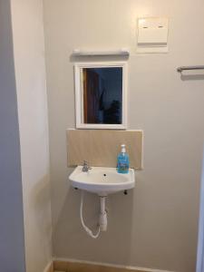 Kúpeľňa v ubytovaní Wike Suites