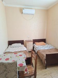 Postel nebo postele na pokoji v ubytování GUEST HOUSE 15A