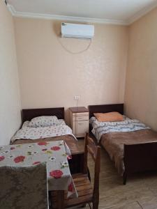 Postel nebo postele na pokoji v ubytování GUEST HOUSE 15A
