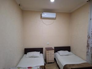 Postel nebo postele na pokoji v ubytování GUEST HOUSE 15A