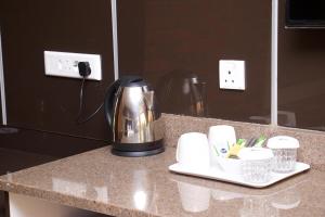 Příslušenství pro přípravu čaje a kávy v ubytování Lovely platinum room - 2180
