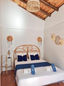 Un pat sau paturi într-o cameră la Vila AL-Castro