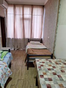 Postel nebo postele na pokoji v ubytování GUEST HOUSE 15A