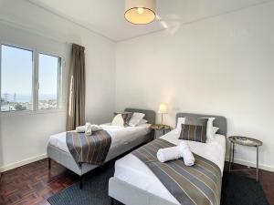 Una cama o camas en una habitación de Casa Santa Rita by Atlantic Holiday