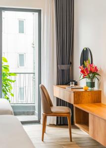 Giường trong phòng chung tại TTR Central Apart Hotel