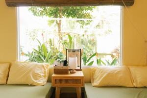 Гостиная зона в Entire First Floor - Nguyên Tầng Trệt- Nhà Mơ Homestay Bến Tre