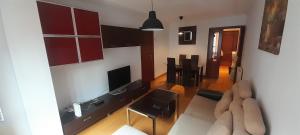 TV a/nebo společenská místnost v ubytování Apartamento Guarnizo