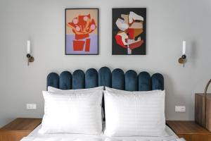 Ein Bett oder Betten in einem Zimmer der Unterkunft Numa Vienna Terra