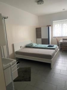 Postel nebo postele na pokoji v ubytování WIT - Wohnen in Tallesbrunn