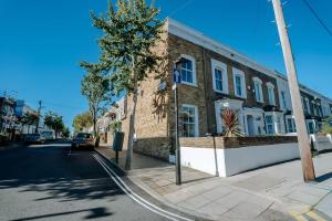 a building on the side of a street at Cliffden Apartment - One bed apartment in London