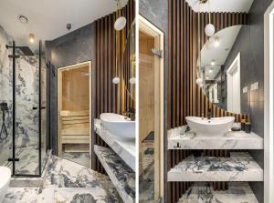 a bathroom with two sinks and a large mirror at 2-Bedroom DeLux Apartment with Private Sauna WWA25 in Warsaw