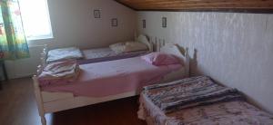 Postel nebo postele na pokoji v ubytování Villa Skomakar Kramfors