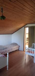 Postel nebo postele na pokoji v ubytování Villa Skomakar Kramfors