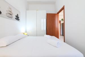 Letto o letti in una camera di PrimoPiano - Scalvini