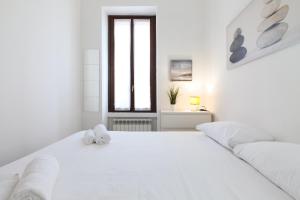 Letto o letti in una camera di PrimoPiano - Scalvini