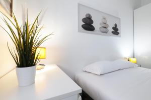 Letto o letti in una camera di PrimoPiano - Scalvini