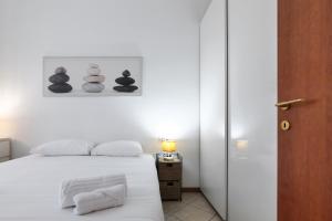 Letto o letti in una camera di PrimoPiano - Scalvini