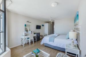Postel nebo postele na pokoji v ubytování Bayview Hotel