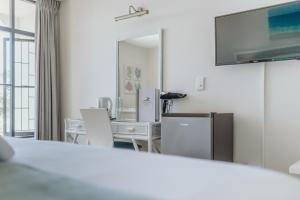 TV a/nebo společenská místnost v ubytování Bayview Hotel