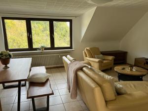 A seating area at St Helena Straße 80 Tourist Apartments