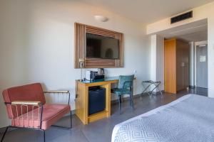 TV a/nebo společenská místnost v ubytování Hotel Costa Salina