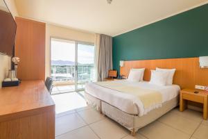 Postel nebo postele na pokoji v ubytování Hotel Costa Salina