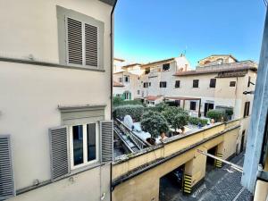 a view of a balcony from a building at Near Ponte Vecchio: central luxury flat in Florence