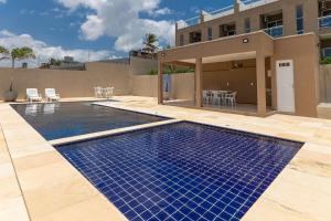 Bazén v ubytování Apartamento no Beach Townhouses 5 por Carpediem nebo v jeho okolí