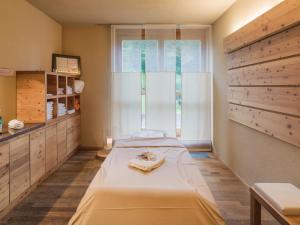 Posteľ alebo postele v izbe v ubytovaní Falkensteiner Residences edelweiss