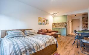 Posezení v ubytování Comfy apartment in New Gudauri F4, room 212 + 8 fotografií